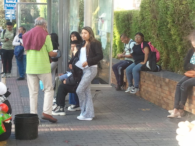 5 reaching out to the people waiting for the bus